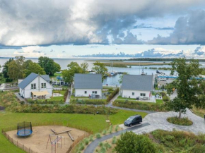Ferienhaus Seenixe mit Kamin und Wasserblick in Altwarp